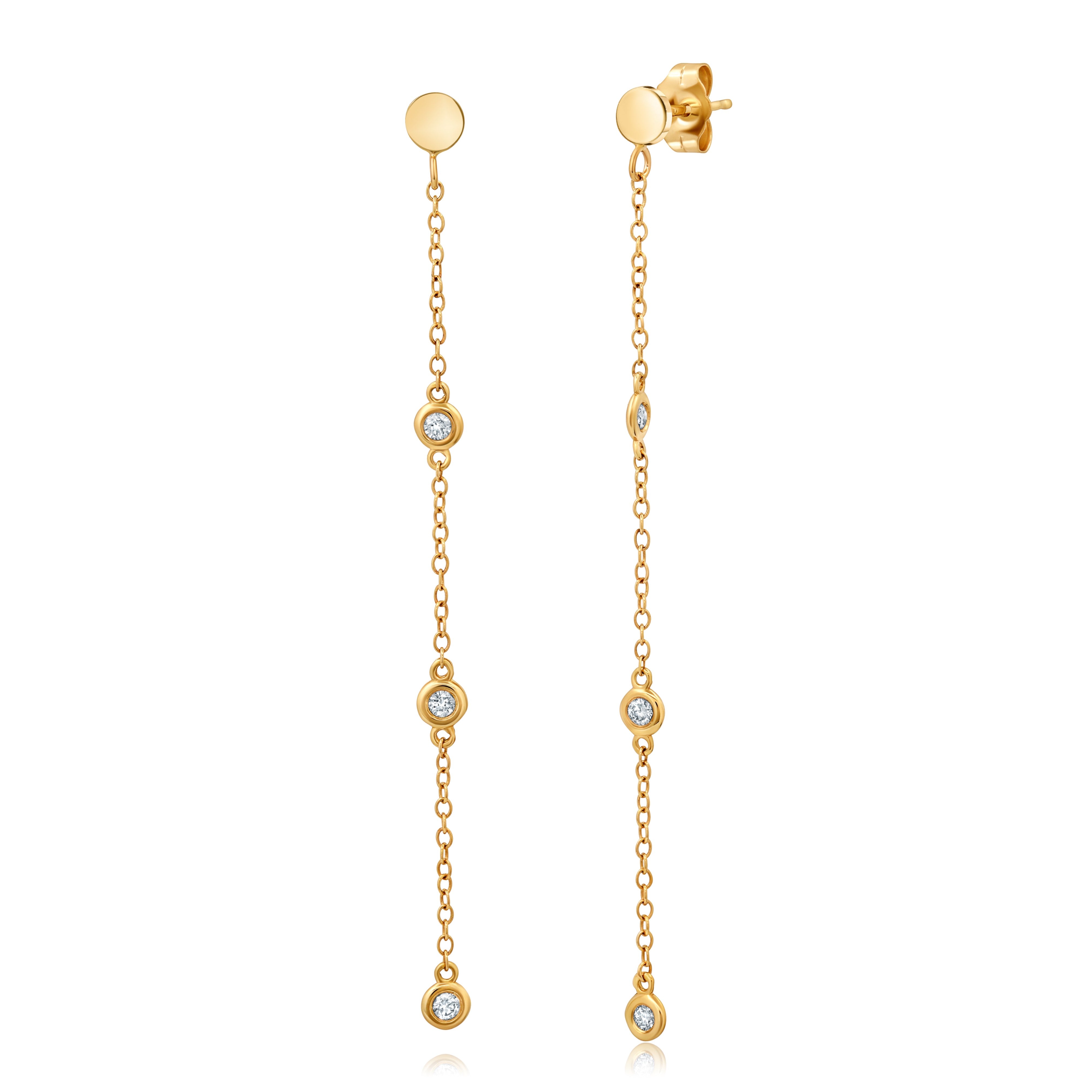 Bezel-set white diamonds in yellow gold