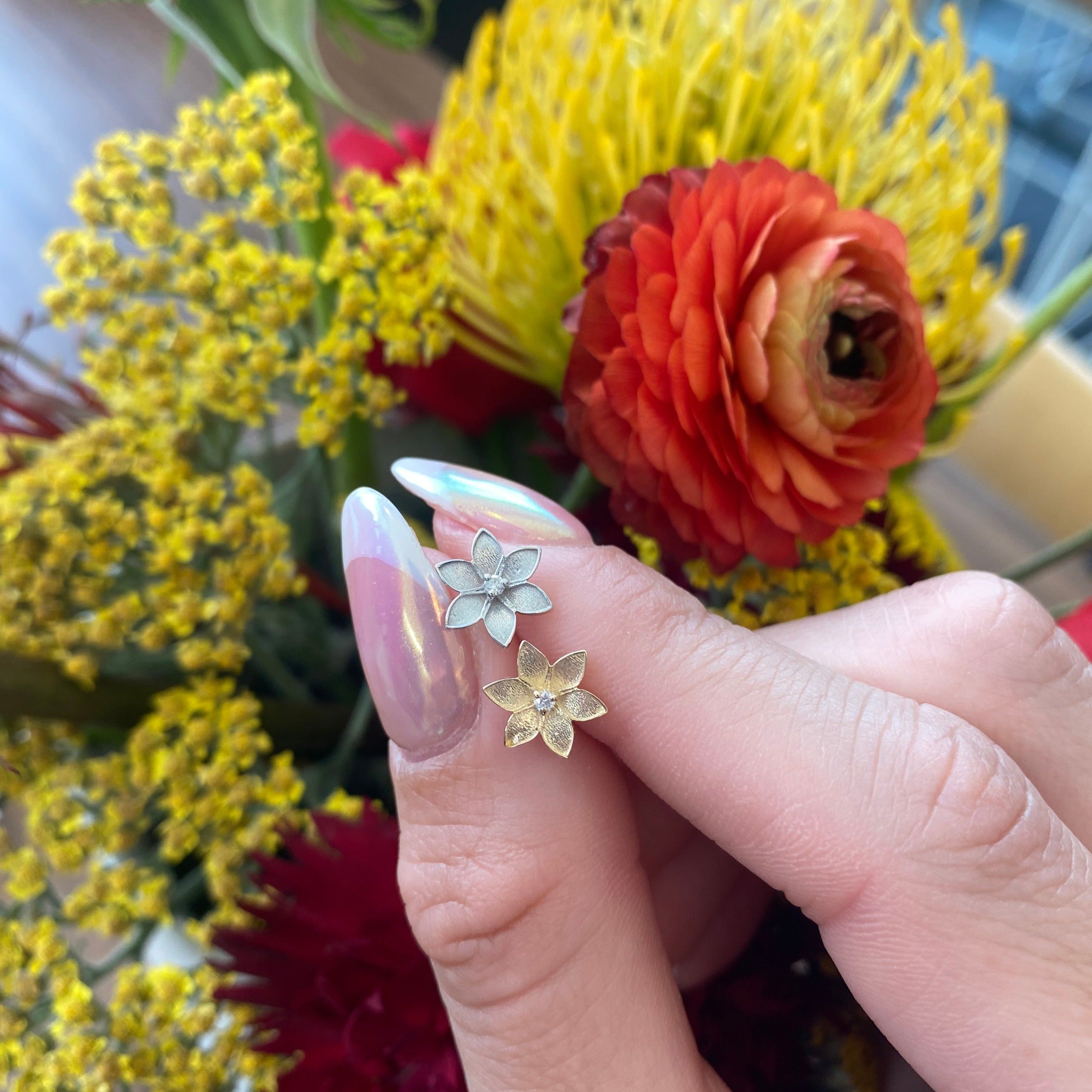 gold flower earrings studs