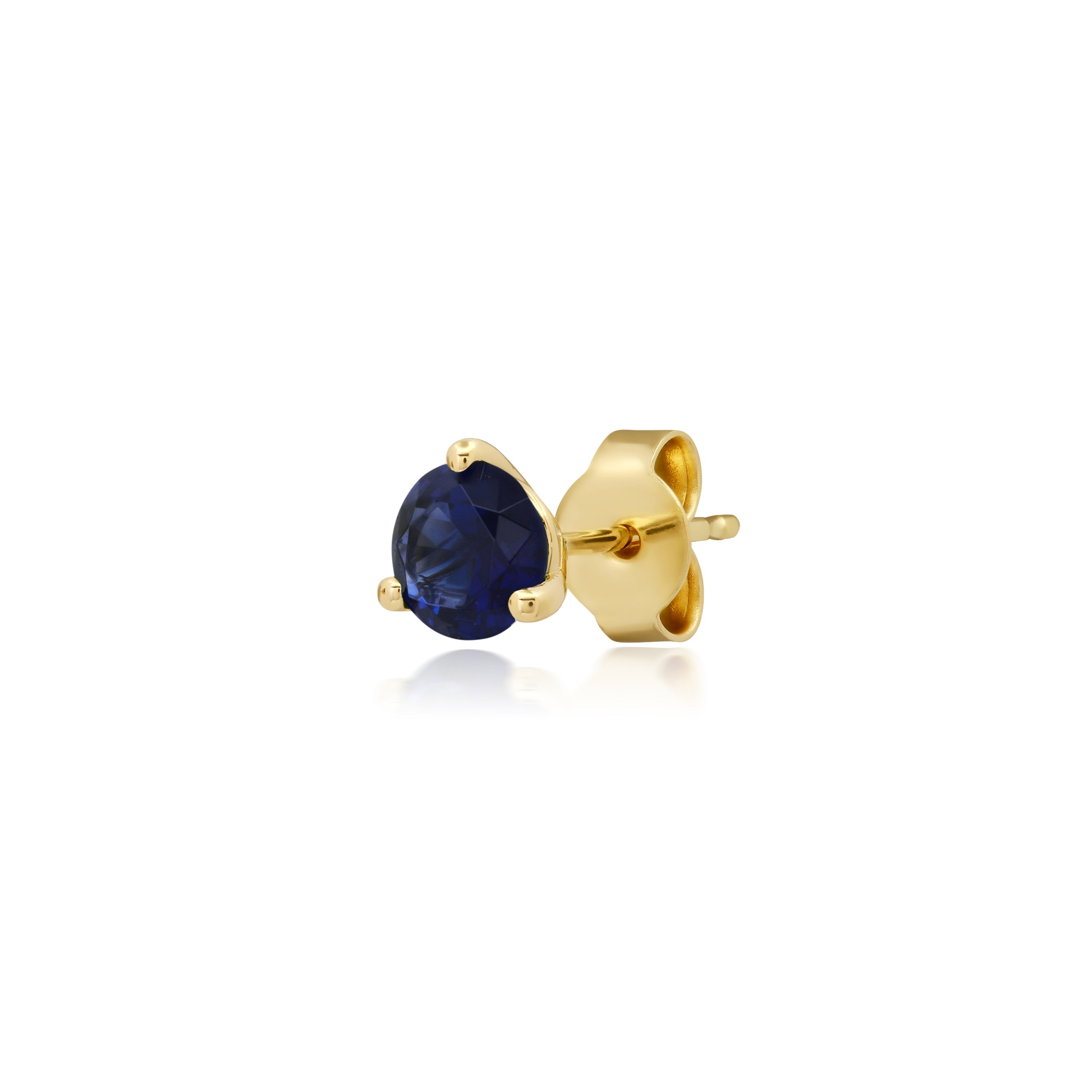 blue sapphire set in 14k yellow gold