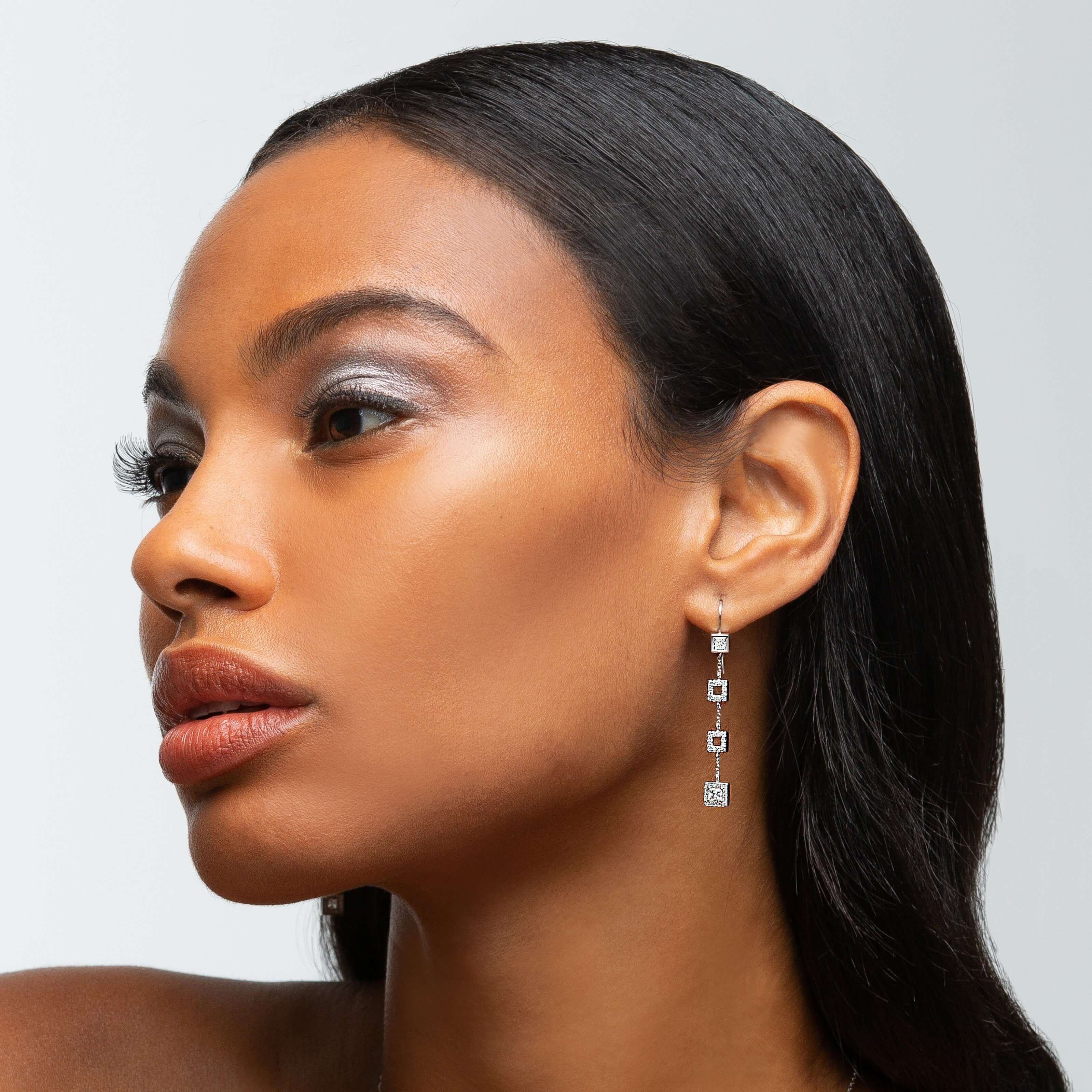 ice queen 18k white gold diamond drop earrings