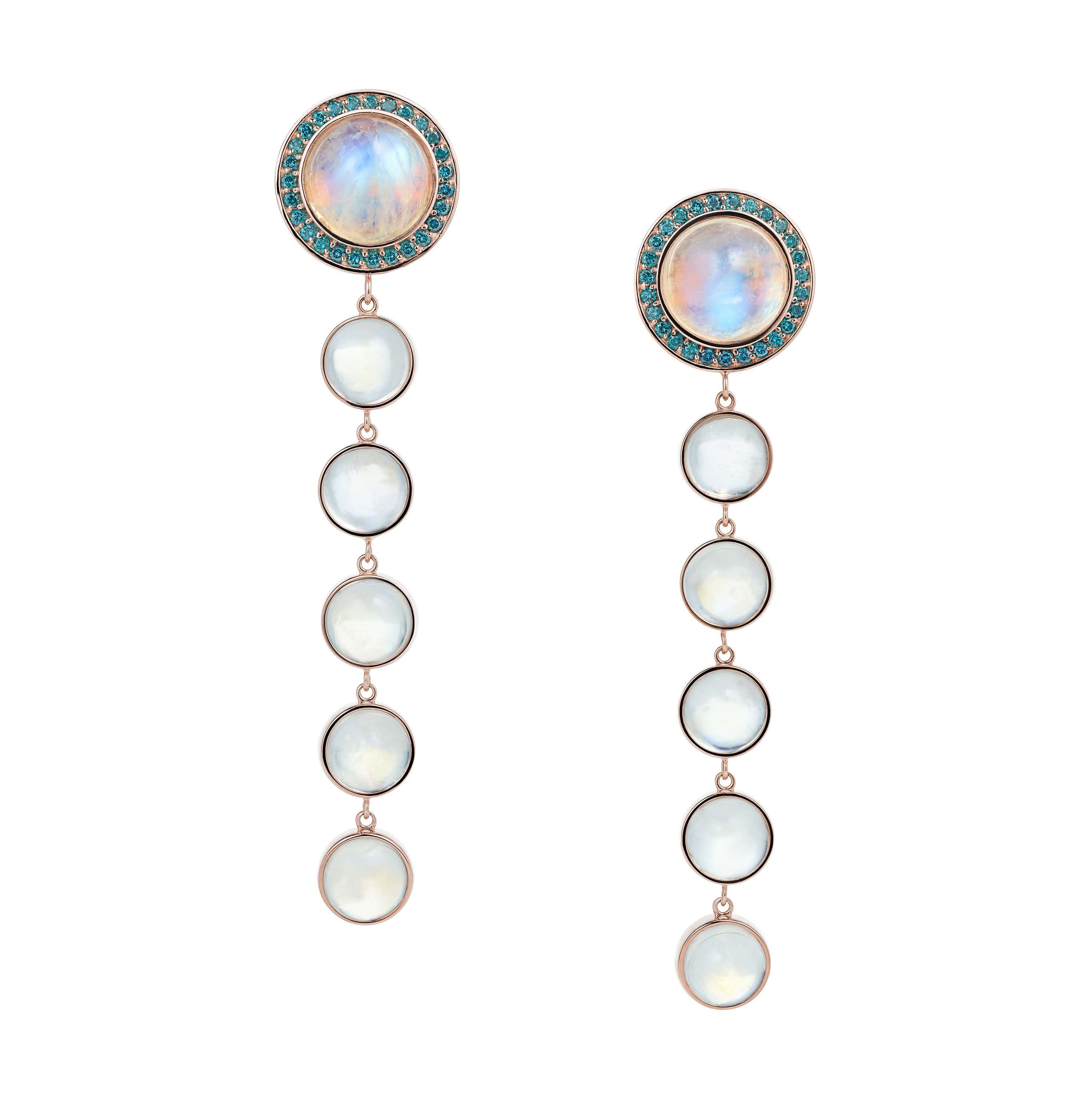 blue diamonds set in 18k rose gold