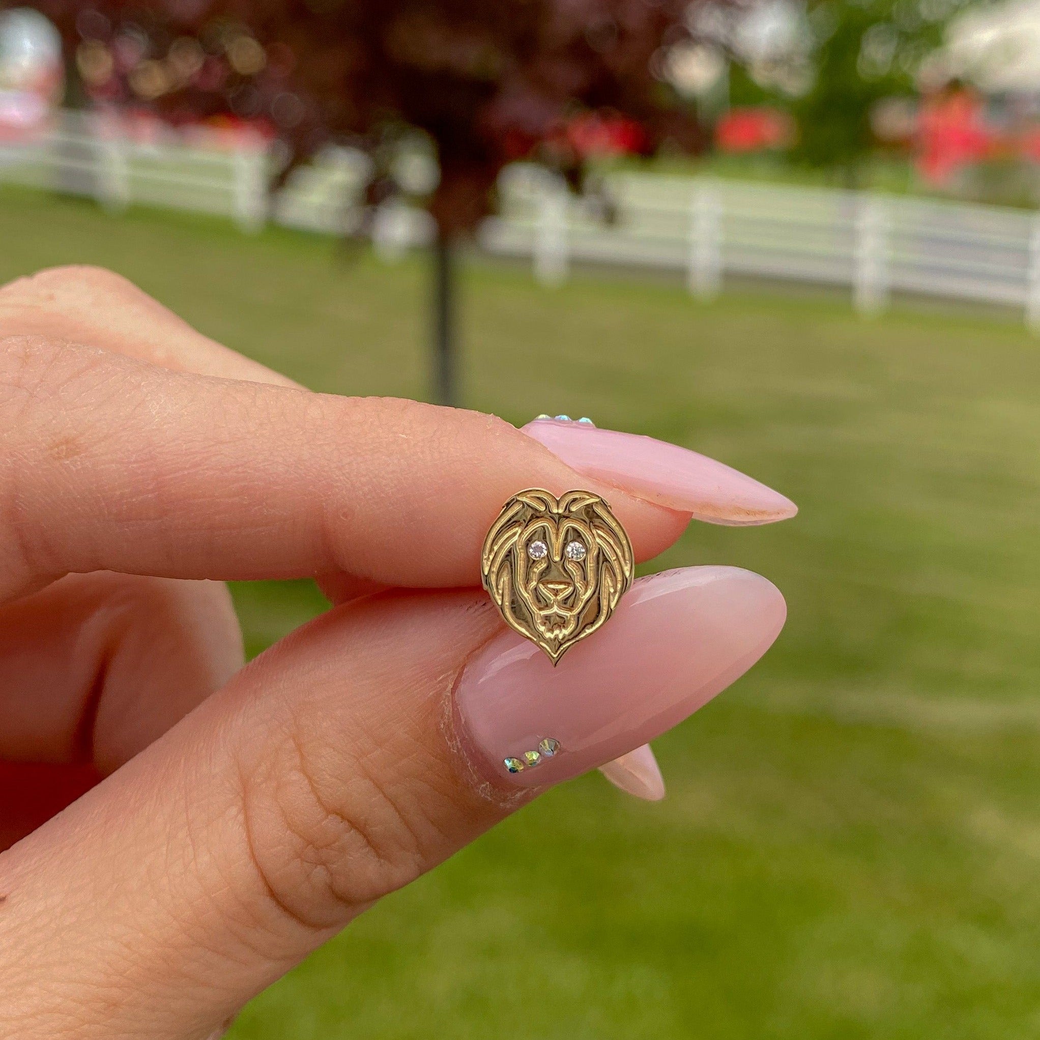 lion stud earring with diamonds