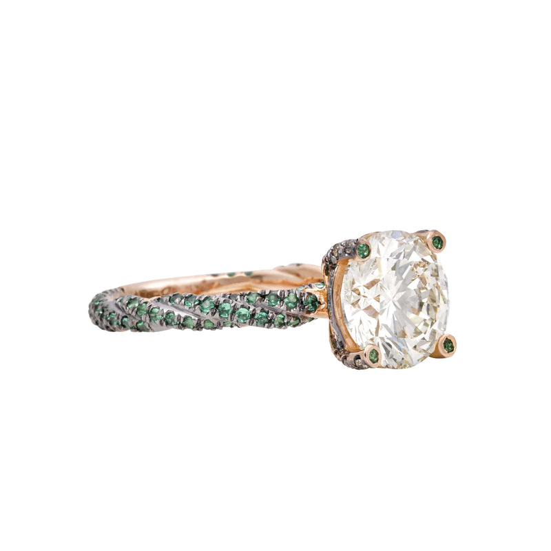 beautiful eden wedding ring with a dimond and emeralds