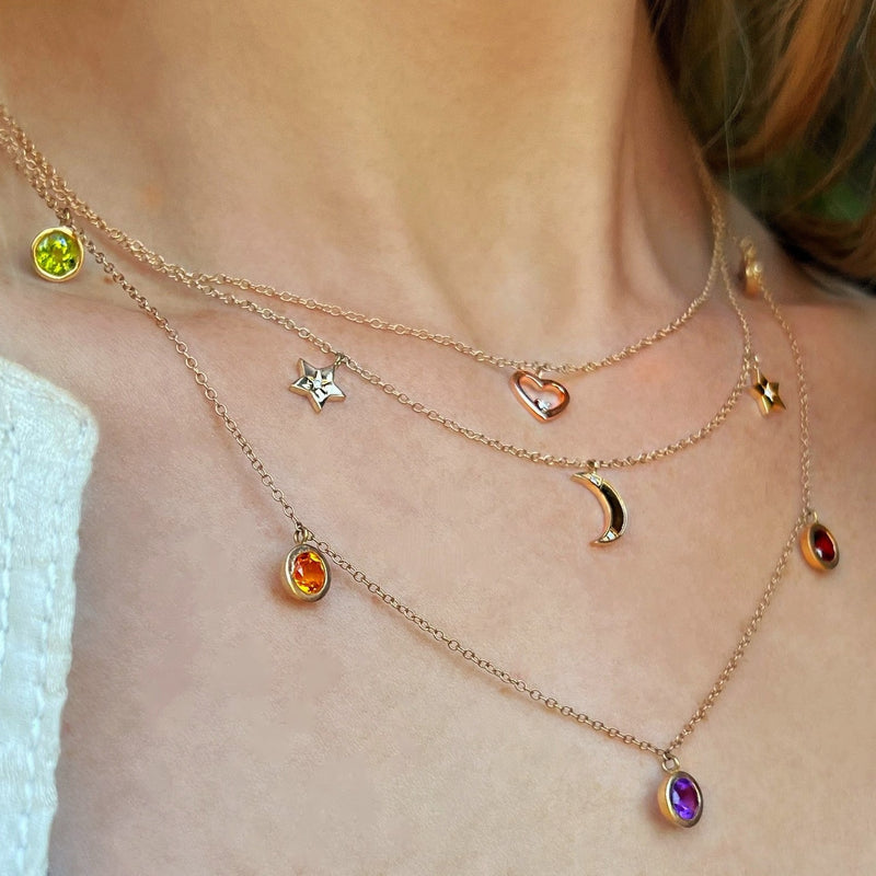 layering necklaces with charms