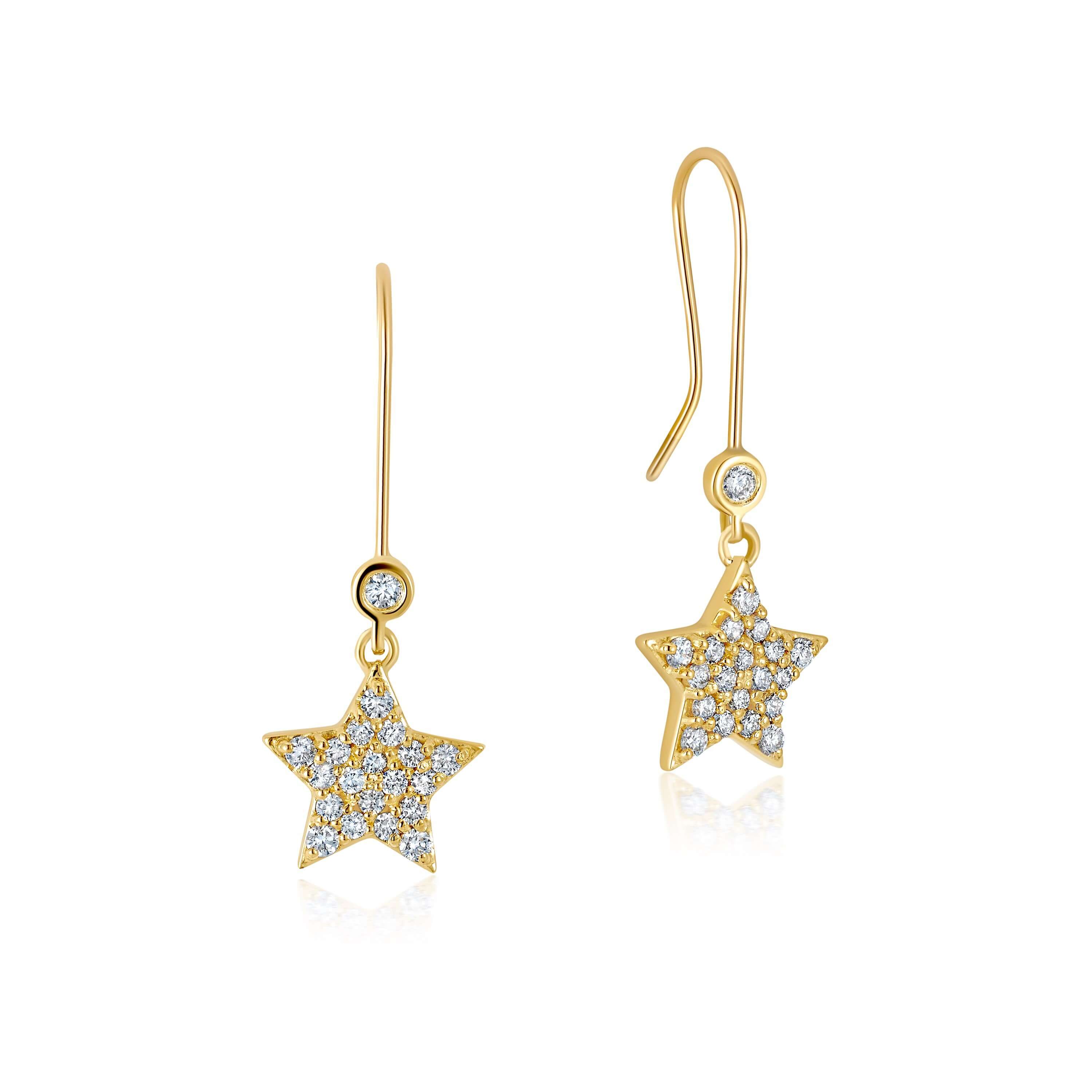 bright earrings inspired by celestial in white diamonds set in 18k yellow gold.